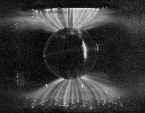 Laboratory simulation of the Van Allen belts' influence on the Solar Wind; these auroral-like Birkeland currents were created by the scientist Kristian Birkeland in his terrella, a magnetised anode globe in an evacutated chamber.