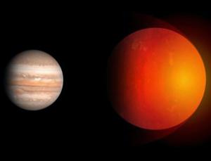 Size issues: TrES-4 is less massive but much larger than Jupiter (Image: Ignacio Gonzlez Tapia/NASA)