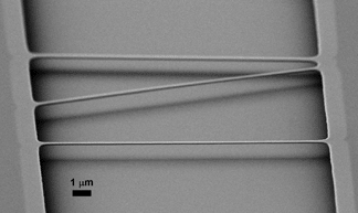 Sharply-tuned nanostrings work at room temperature