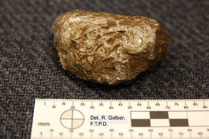 Metallic rock that crashed into house in New Jersey photo