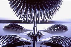 "Protrude, Flow," showing ferrofluid with poles above and below ( Sachiko Kodama & Minako Takeno; Photo by Yozo Takada)