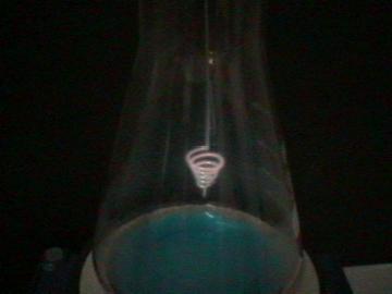 Platinum wire hanging over methanol