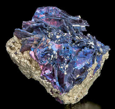 http://www.exceptionalminerals.com/Tucson2012-324CovellitePyriteLeonardMineMontana57mm.jpg