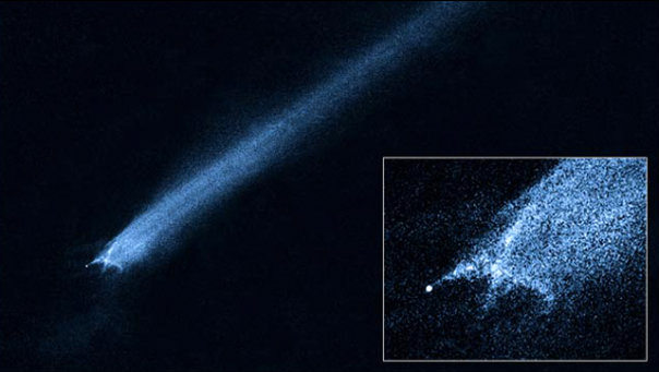 Close up of an X-shaped objected spotted by astronomers using the Hubble Space Telescope between January and May 2010. The images show the object P/2010 A2, an X-shaped objected created by two colliding asteroids.