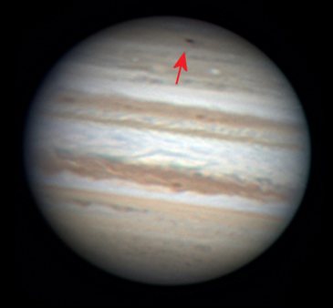 Amateur astronomer Anthony Wesley snapped this image of the new black spot (near the top of Jupiter's disc) on Sunday, just after discovering it (Image: Anthony Wesley)