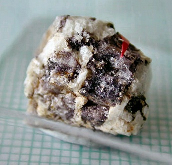 http://webmineral.com/specimens/photos/Kuliokite-(Y).jpg