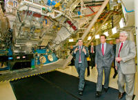 California governor Arnold Schwarzenegger toured the stadium-sized NIF on Nov. 10, 2008. Pictured from left: NIF director Dr. Edward Moses, Governor Schwarzenegger, LLNL Director Dr. George Miller. 