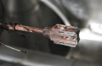 The remains of the target assembly after the October 6th, 2010 shot. The NIF's 192-beam laser system fired 1 megajoule of laser energy into its first cryogenically layered capsule. A megajoule is equivalent to the energy consumed by 10,000 100-watt light bulbs in one second.